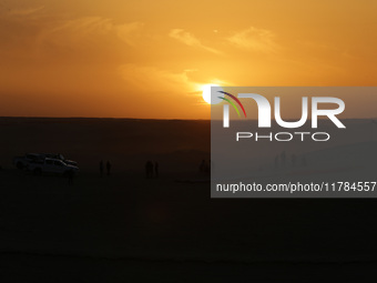 The photo, taken in Oued Souf, Algeria, on November 16, 2024, shows a sunset during the 6th International Saharan Tourism Festival (FITS). O...