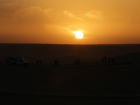 The photo, taken in Oued Souf, Algeria, on November 16, 2024, shows a sunset during the 6th International Saharan Tourism Festival (FITS). O...