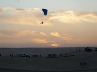 The photo, taken in Oued Souf, Algeria, on November 16, 2024, shows a sunset during the 6th International Saharan Tourism Festival (FITS). O...