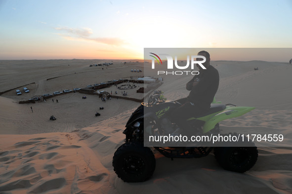 The photo, taken in Oued Souf, Algeria, on November 16, 2024, shows a sunset during the 6th International Saharan Tourism Festival (FITS). O...