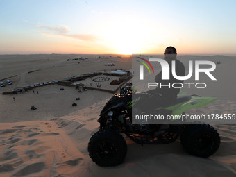 The photo, taken in Oued Souf, Algeria, on November 16, 2024, shows a sunset during the 6th International Saharan Tourism Festival (FITS). O...