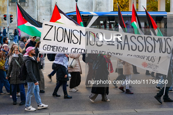 A demonstration in Munich, Germany, on November 16, 2024, includes pro-Palestinian demonstrators and pro-Israeli counter-demonstrators with...