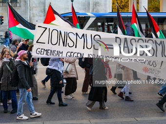 A demonstration in Munich, Germany, on November 16, 2024, includes pro-Palestinian demonstrators and pro-Israeli counter-demonstrators with...