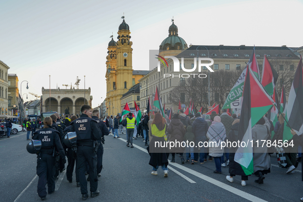 A demonstration in Munich, Germany, on November 16, 2024, includes pro-Palestinian demonstrators and pro-Israeli counter-demonstrators with...