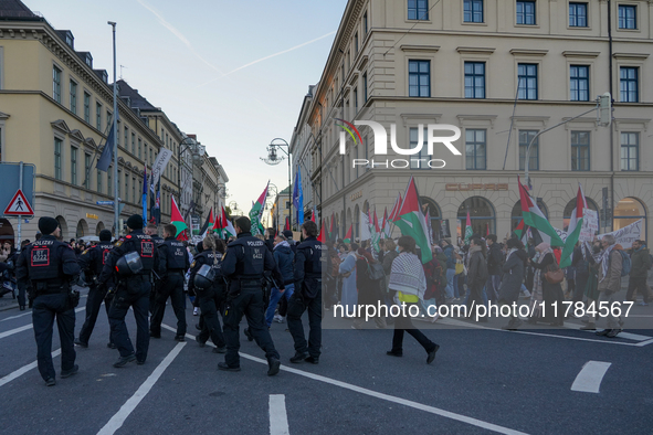 A demonstration in Munich, Germany, on November 16, 2024, includes pro-Palestinian demonstrators and pro-Israeli counter-demonstrators with...