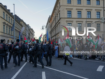 A demonstration in Munich, Germany, on November 16, 2024, includes pro-Palestinian demonstrators and pro-Israeli counter-demonstrators with...