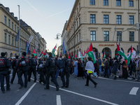 A demonstration in Munich, Germany, on November 16, 2024, includes pro-Palestinian demonstrators and pro-Israeli counter-demonstrators with...