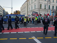 A demonstration in Munich, Germany, on November 16, 2024, includes pro-Palestinian demonstrators and pro-Israeli counter-demonstrators with...