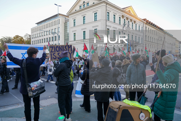 A demonstration in Munich, Germany, on November 16, 2024, includes pro-Palestinian demonstrators and pro-Israeli counter-demonstrators with...