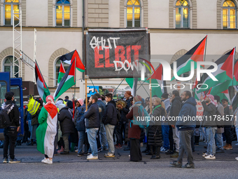 A demonstration in Munich, Germany, on November 16, 2024, includes pro-Palestinian demonstrators and pro-Israeli counter-demonstrators with...