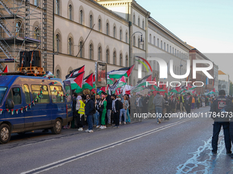 A demonstration in Munich, Germany, on November 16, 2024, includes pro-Palestinian demonstrators and pro-Israeli counter-demonstrators with...