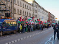 A demonstration in Munich, Germany, on November 16, 2024, includes pro-Palestinian demonstrators and pro-Israeli counter-demonstrators with...