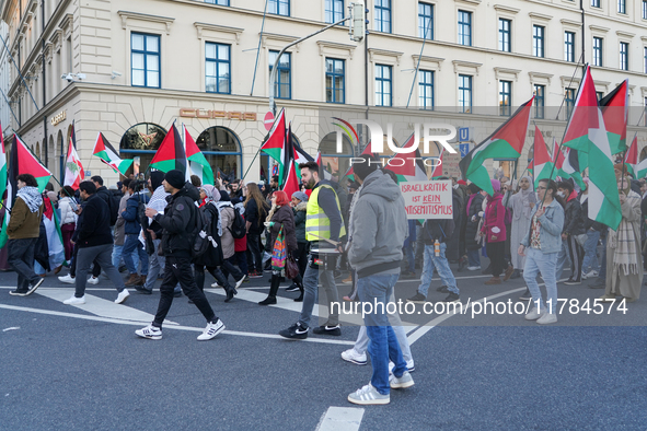 A demonstration in Munich, Germany, on November 16, 2024, includes pro-Palestinian demonstrators and pro-Israeli counter-demonstrators with...