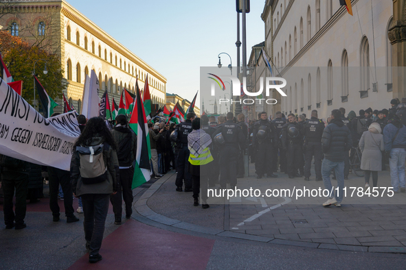 A demonstration in Munich, Germany, on November 16, 2024, includes pro-Palestinian demonstrators and pro-Israeli counter-demonstrators with...