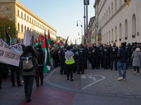 A demonstration in Munich, Germany, on November 16, 2024, includes pro-Palestinian demonstrators and pro-Israeli counter-demonstrators with...