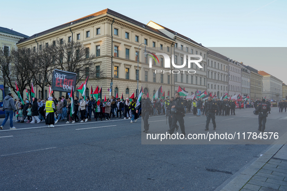 A demonstration in Munich, Germany, on November 16, 2024, includes pro-Palestinian demonstrators and pro-Israeli counter-demonstrators with...