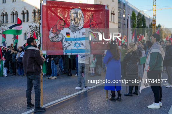 A demonstration in Munich, Germany, on November 16, 2024, includes pro-Palestinian demonstrators and pro-Israeli counter-demonstrators with...