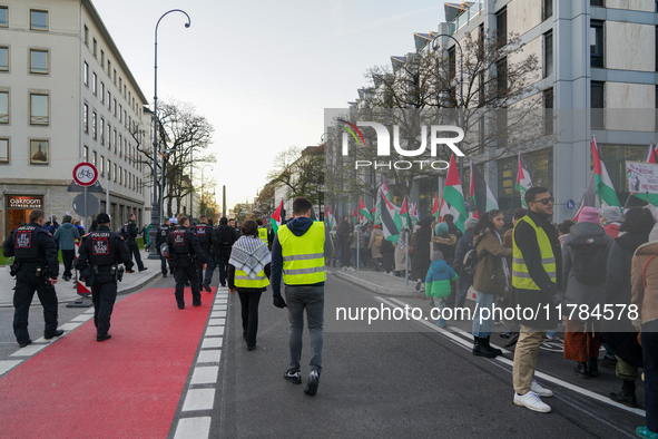 A demonstration in Munich, Germany, on November 16, 2024, includes pro-Palestinian demonstrators and pro-Israeli counter-demonstrators with...