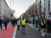 A demonstration in Munich, Germany, on November 16, 2024, includes pro-Palestinian demonstrators and pro-Israeli counter-demonstrators with...