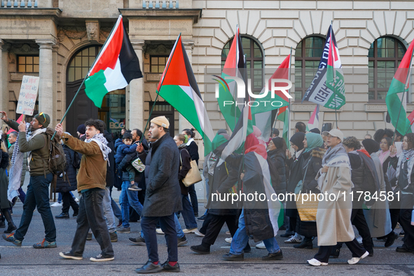 A demonstration in Munich, Germany, on November 16, 2024, includes pro-Palestinian demonstrators and pro-Israeli counter-demonstrators with...