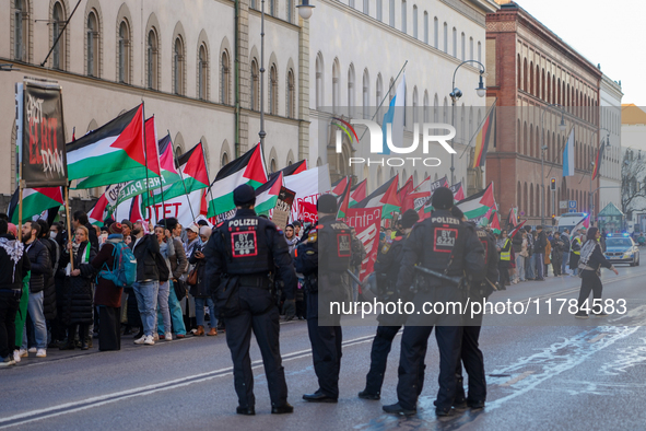 A demonstration in Munich, Germany, on November 16, 2024, includes pro-Palestinian demonstrators and pro-Israeli counter-demonstrators with...