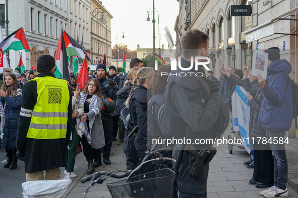 A demonstration in Munich, Germany, on November 16, 2024, includes pro-Palestinian demonstrators and pro-Israeli counter-demonstrators with...