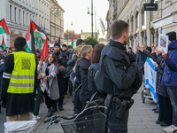 A demonstration in Munich, Germany, on November 16, 2024, includes pro-Palestinian demonstrators and pro-Israeli counter-demonstrators with...