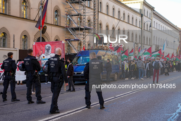 A demonstration in Munich, Germany, on November 16, 2024, includes pro-Palestinian demonstrators and pro-Israeli counter-demonstrators with...