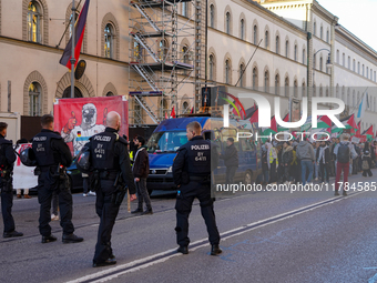 A demonstration in Munich, Germany, on November 16, 2024, includes pro-Palestinian demonstrators and pro-Israeli counter-demonstrators with...