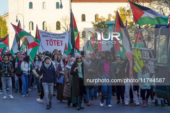 A demonstration in Munich, Germany, on November 16, 2024, includes pro-Palestinian demonstrators and pro-Israeli counter-demonstrators with...