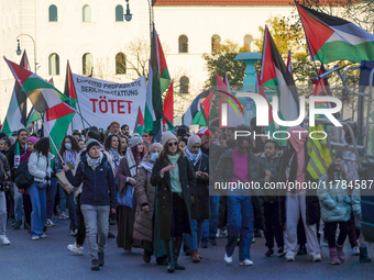 A demonstration in Munich, Germany, on November 16, 2024, includes pro-Palestinian demonstrators and pro-Israeli counter-demonstrators with...