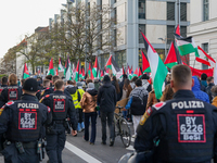 A demonstration in Munich, Germany, on November 16, 2024, includes pro-Palestinian demonstrators and pro-Israeli counter-demonstrators with...