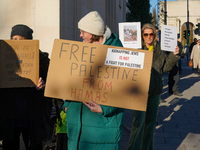 A demonstration in Munich, Germany, on November 16, 2024, includes pro-Palestinian demonstrators and pro-Israeli counter-demonstrators with...