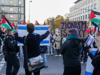 A demonstration in Munich, Germany, on November 16, 2024, includes pro-Palestinian demonstrators and pro-Israeli counter-demonstrators with...