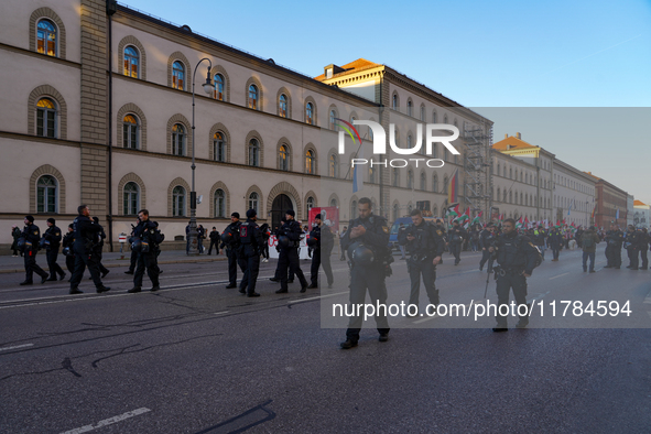 A demonstration in Munich, Germany, on November 16, 2024, includes pro-Palestinian demonstrators and pro-Israeli counter-demonstrators with...