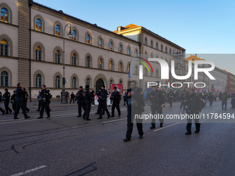 A demonstration in Munich, Germany, on November 16, 2024, includes pro-Palestinian demonstrators and pro-Israeli counter-demonstrators with...