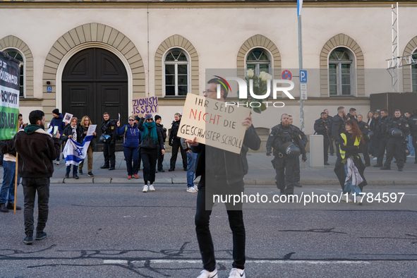 A demonstration in Munich, Germany, on November 16, 2024, includes pro-Palestinian demonstrators and pro-Israeli counter-demonstrators with...