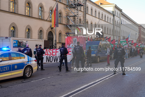 A demonstration in Munich, Germany, on November 16, 2024, includes pro-Palestinian demonstrators and pro-Israeli counter-demonstrators with...