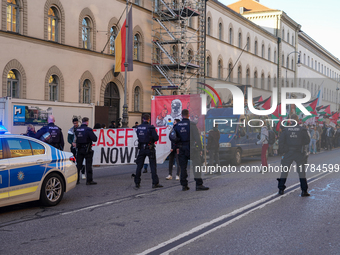 A demonstration in Munich, Germany, on November 16, 2024, includes pro-Palestinian demonstrators and pro-Israeli counter-demonstrators with...