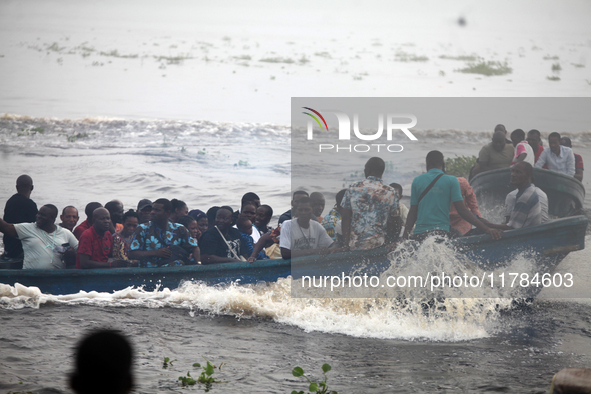 Residents in a boat in Ugbonla, Ilaje, Local Government Area, Ondo State, Nigeria, head to their polling unit during the 2024 Governorship e...