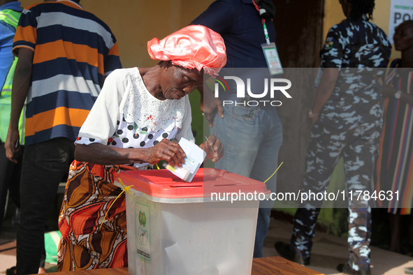 A woman votes during the 2024 Governorship election for Ondo State in Obenla, Ilaje, Local Government Area, Ondo State, Nigeria, on November...