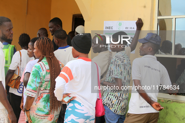 Voters queue during the 2024 Governorship election for Ondo State in Obenla, Ilaje, Local Government Area, Ondo State, Nigeria, on November...