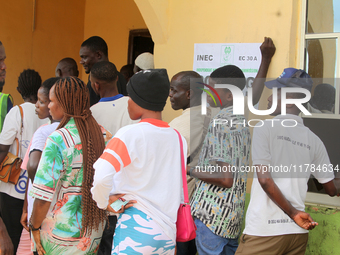 Voters queue during the 2024 Governorship election for Ondo State in Obenla, Ilaje, Local Government Area, Ondo State, Nigeria, on November...