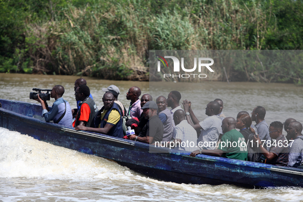 Journalists depart a jetty after covering election processes during the 2024 Governorship election for Ondo State in Obenla, Ilaje, Local Go...