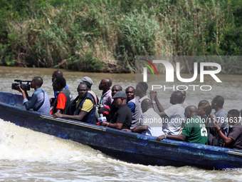 Journalists depart a jetty after covering election processes during the 2024 Governorship election for Ondo State in Obenla, Ilaje, Local Go...