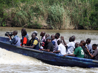 Journalists depart a jetty after covering election processes during the 2024 Governorship election for Ondo State in Obenla, Ilaje, Local Go...