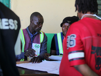 An INEC official writes election results at Ward 2, Unity 6 during the 2024 Governorship election for Ondo State in Ugbonla, Ilaje, Local Go...