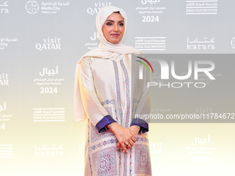 Fatma Al Remaihi, CEO of the Doha Film Institute, attends the ''Sudan, Remember Us'' red carpet during the screening on the opening night of...