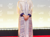 Fatma Al Remaihi, CEO of the Doha Film Institute, attends the ''Sudan, Remember Us'' red carpet during the screening on the opening night of...