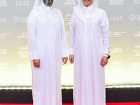 Abdulla Al Mosallam, CAO of the Ajyal Film Festival, and Mohamed Bin Hamad Al Thani attend the ''Sudan, Remember Us'' red carpet during the...